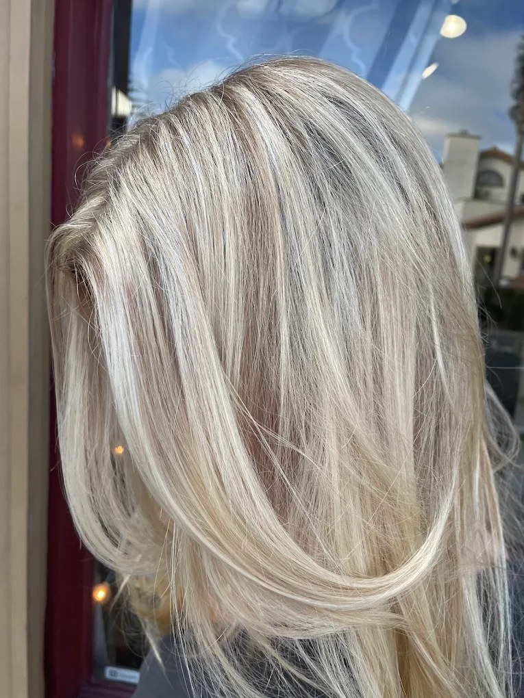 Dimensional blonde highlights styled at Entourage Salon