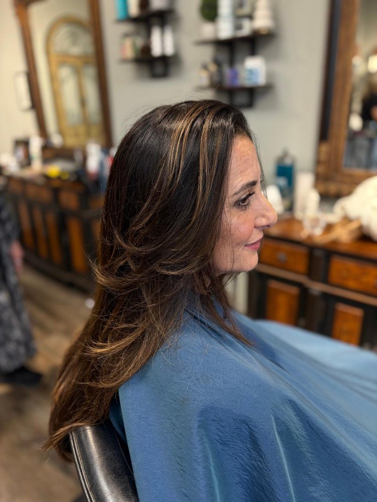 Glossy dimensional brunette color at Entourage Salon
