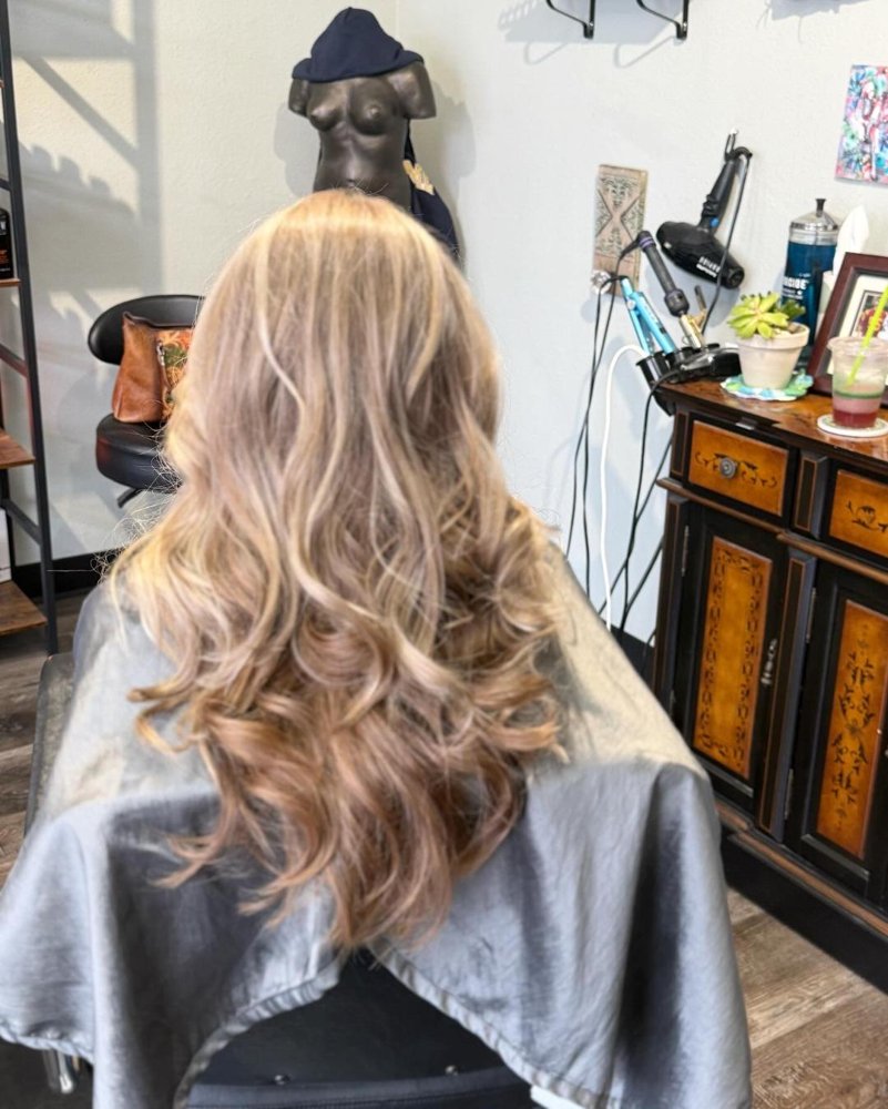 Hand-painted dimensional blonde highlights at Entourage Salon