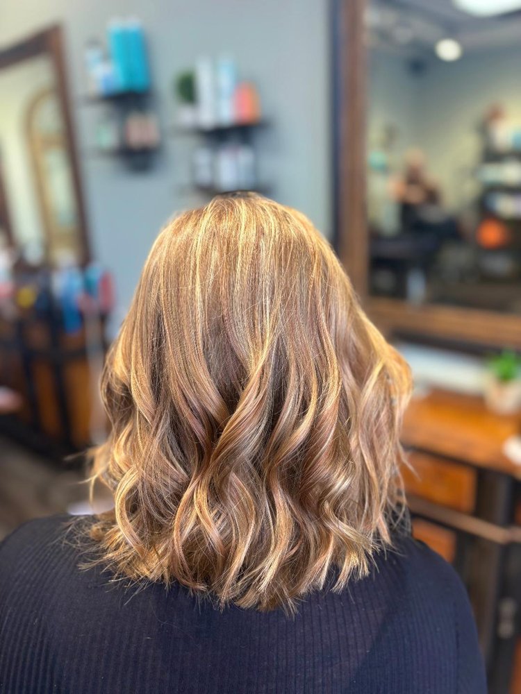 Soft blowout waves styled at Entourage Salon