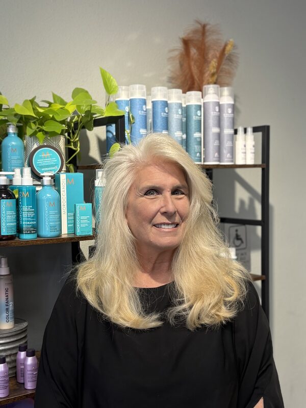 Portrait of Amy, salon owner and front-of-house at Entourage Salon
